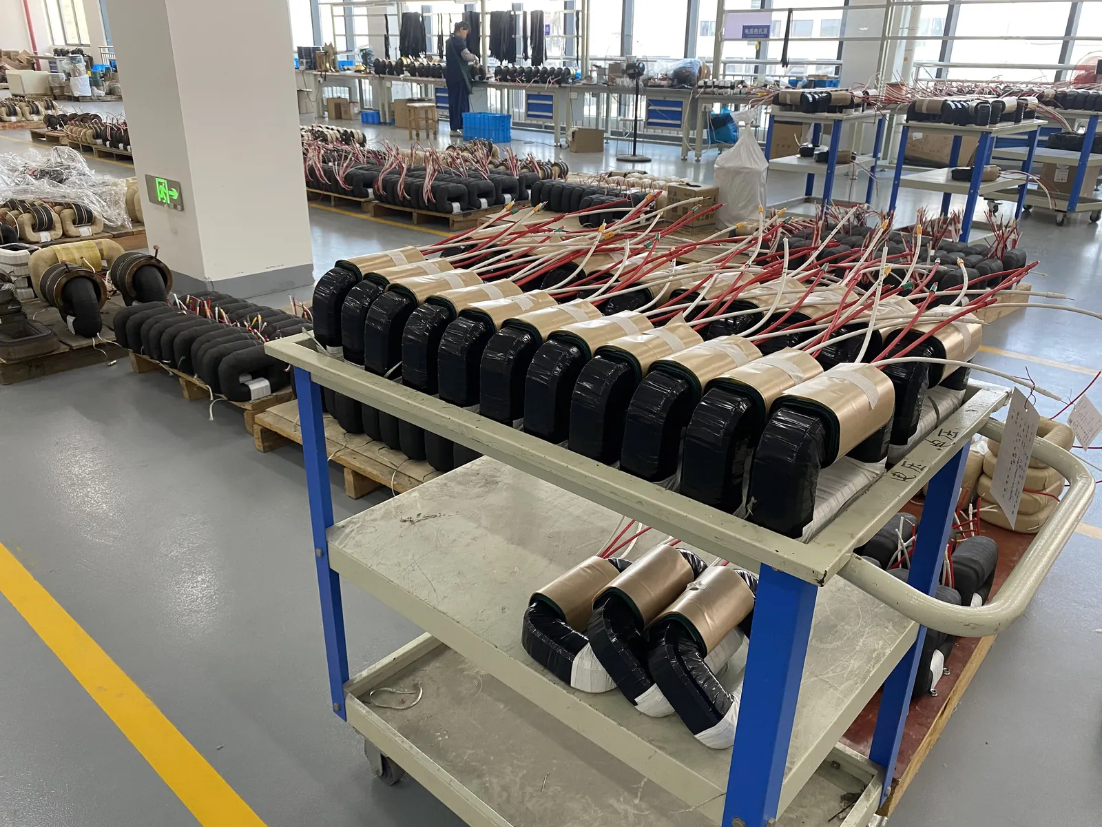 Instrument transformer coils arranged on the production line